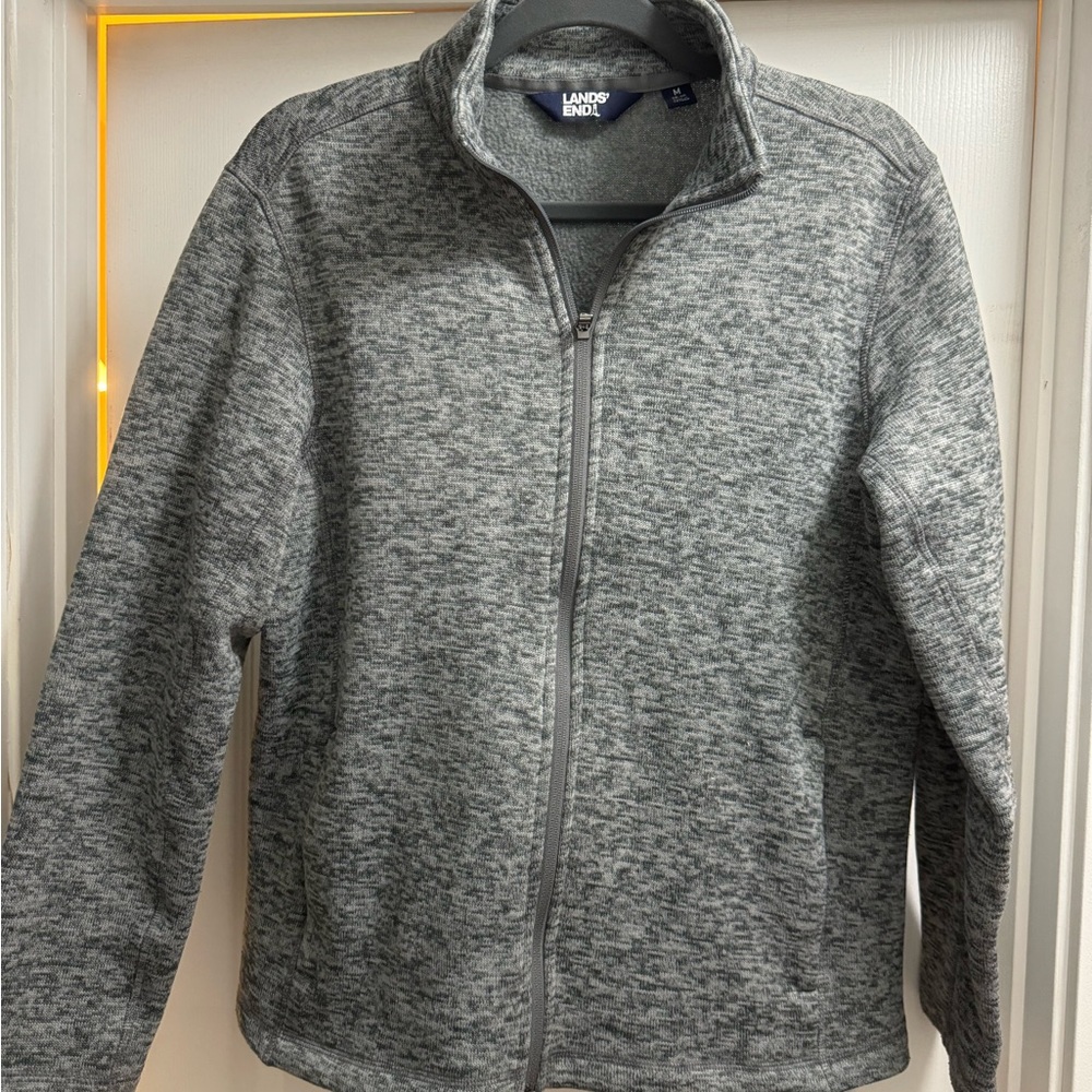 Gray zip up sweater. Gently worn